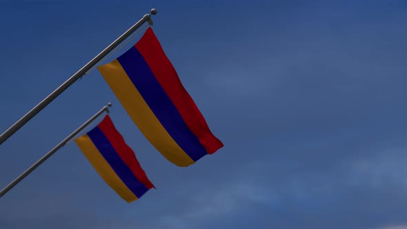 Armenia flags in the blue sky - 4K