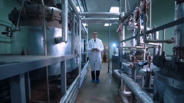 Confident Man with the Tablet