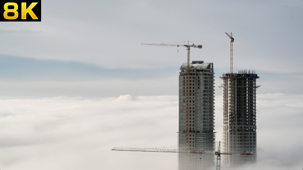 Skyscraper Constructions Rise Above the Clouds