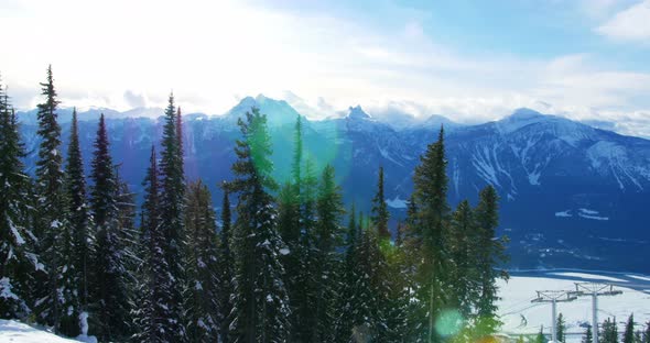 Person snowboarding on snowy mountain