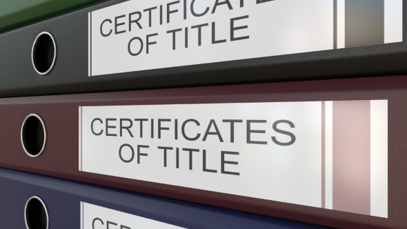 Office Binders with Certicicates of Title Tags