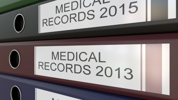 Office Binders with Medical Records Tags Different Years alt
