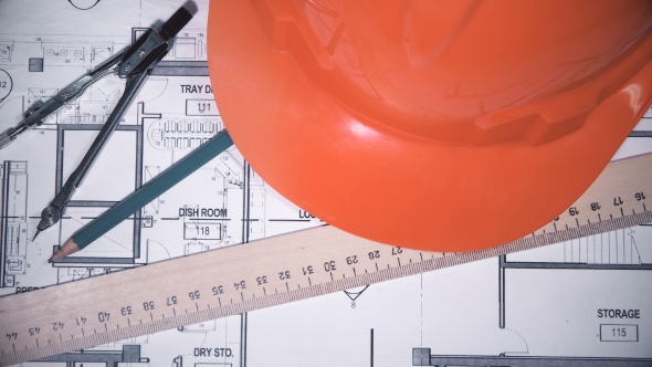 Engineer's Desk with Drawings, Helmet, Ruler, Pencil