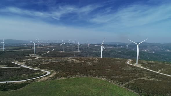 Aerial View of Windmills on Wind Farm in Rotation