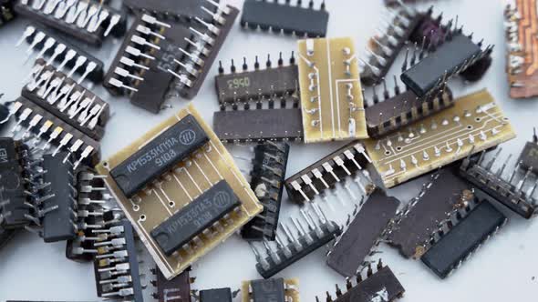 A Scattering of Various Old Radio Components Microchips.