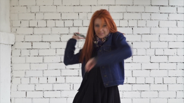 Woman Dancing with a Smartphone
