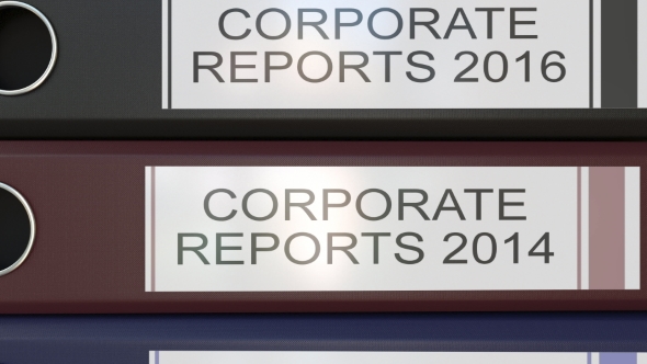 Vertical Stack of Multicolor Office Binders with Corporate Reports Tags Different Years alt