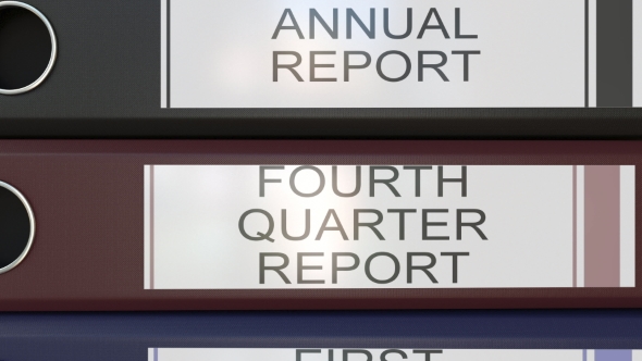 Vertical Stack of Multicolor Office Binders with Quarter and Annual Reports Tags alt