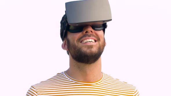 Smiling Man in Virtual Reality Headset Outdoors