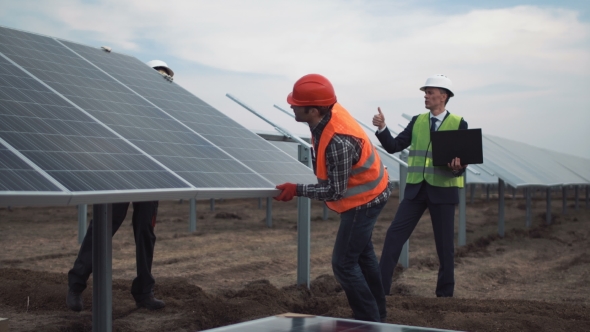 Installation of Photovoltaic Panels on a Solar Farm