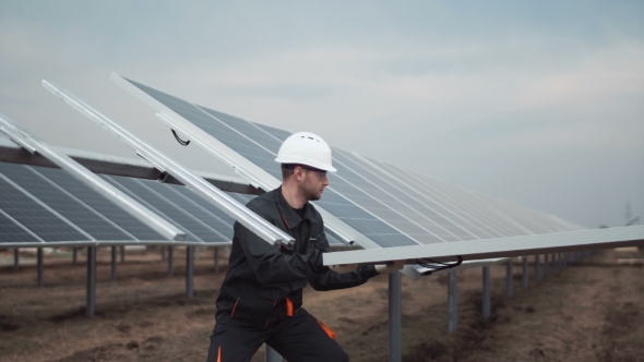 Workers Install the Photovoltaic Panel