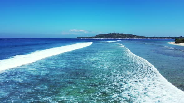 spotless Bantayan Island white sand beach and sandbar. foamy waves splashing on the island