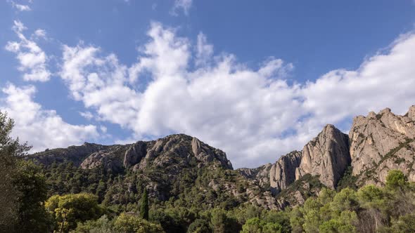Lopable Timelapse of Clouds Passing Over Montserrat in Barcelona