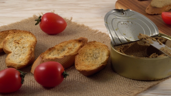 Fresh Pate with Bread on Wooden Table