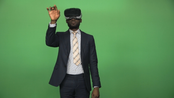 Black Man Using VR Glasses