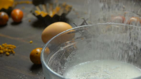 Sugar Powder Is Poured Into a Bowl