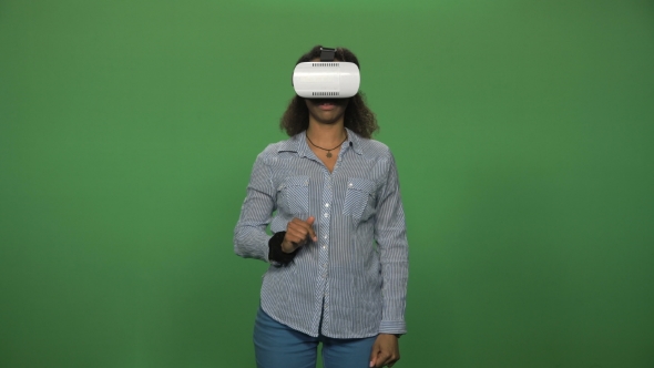 Black Female Using VR Glasses