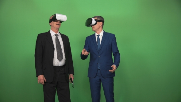 Two Businessman Using VR Headsets