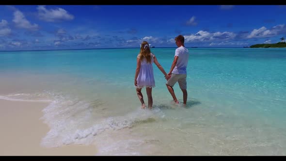 Guy and girl tan on marine resort beach adventure by transparent lagoon with bright sandy background