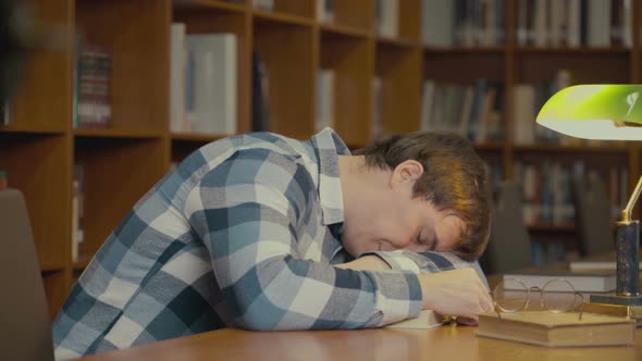 Man Sleeping on the Book