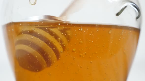 Honey dipper used in jar slow-mo  1920X1080 HD footage - Slow motion wooden utensil dipped in sweet 