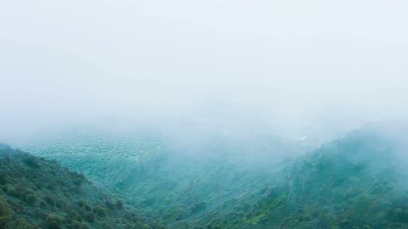 Dangerous Stormy Weather, Humidity, Thick Fog in Mountains. Risky Expedition