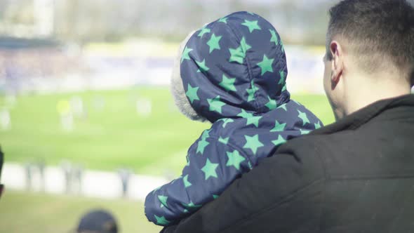 Fans in the Stadium During the Game