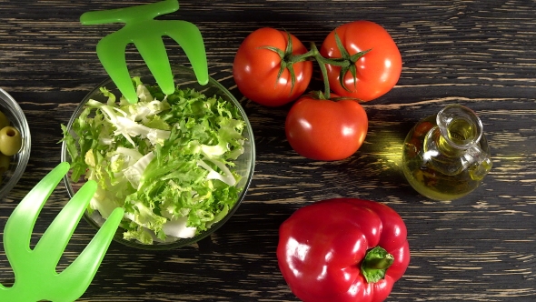 Vegetables Ingridients for Salad on Rustic Wooden Background.