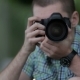Young Man Taking Pictures At A Professional Digital Slr Camera - VideoHive Item for Sale
