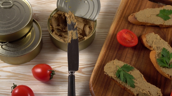 Fresh Pate with Bread on Wooden Table