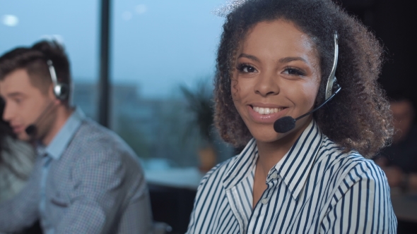 Cheerful Woman in Call Center