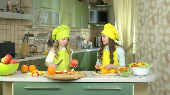 Little Girls in the Kitchen.