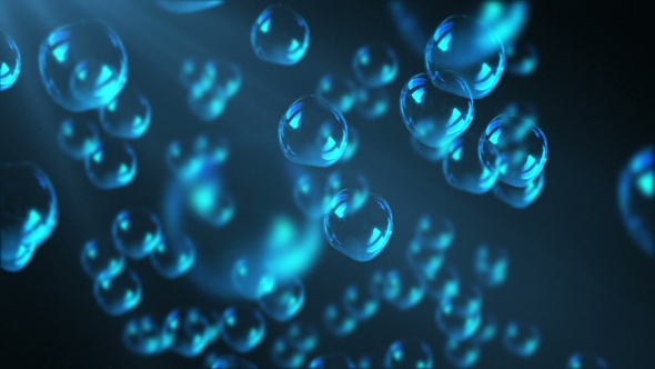 Bubbles Float To the Surface of Blue Water alt