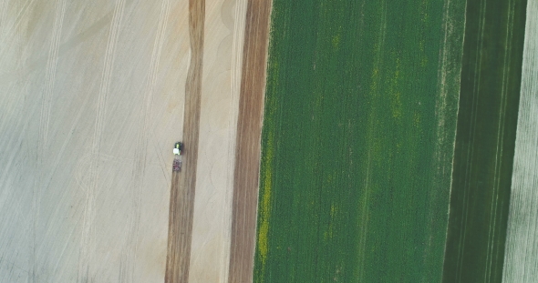 Aerial Shoot of Tractor Working on Field