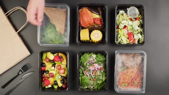 Closing Take Away Meals Top View Food Delivery in Closed Disposable Containers Balanced Nutrition