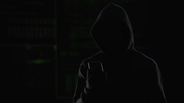 Dark hood man blocked antivirus, infecting computer system, cyber attack