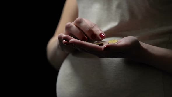 Pregnant Girl Counting Coins, Poor Social Help, Expensive Prenatal Care, Closeup