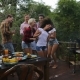 Young People Dancing While Cooking Barbecue Happy Group Cheerful Gathering On Summer Terrace Having - VideoHive Item for Sale