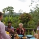 Couple Bring Juice People Passing Food Eating On Terrace Young Friends Talking Sitting At Table - VideoHive Item for Sale
