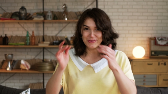 Young Exited Woman Speaks Emotionally and Blab Actively Without Stopping