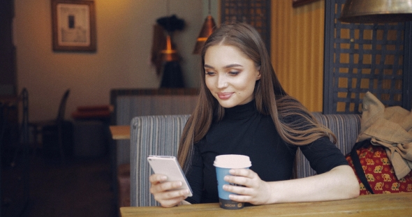 Girl with Coffee and Smartphone