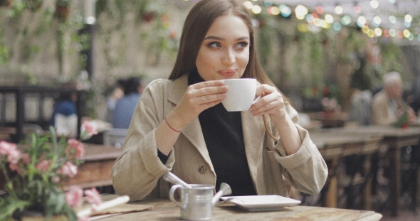 Lovely Female Enjoying Coffee