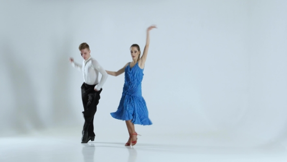 Couple of Graceful Dancers Perform Latino on White Background, Shadow