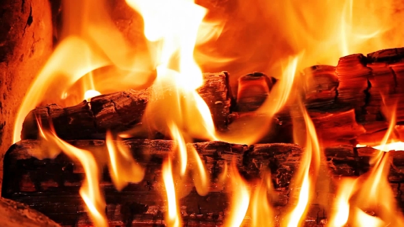 Logs Burning in Fireplace