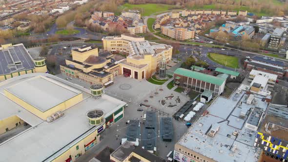 Reverse aerial view of Basildon Town Centre in the morning sun