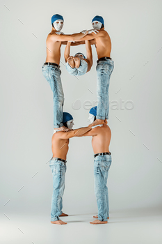 , jeans posing on gray studio background