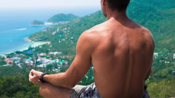 Men Meditating on the Top of an Viewpoint in Direction To Sairee Beach and Nang Yuan Island in