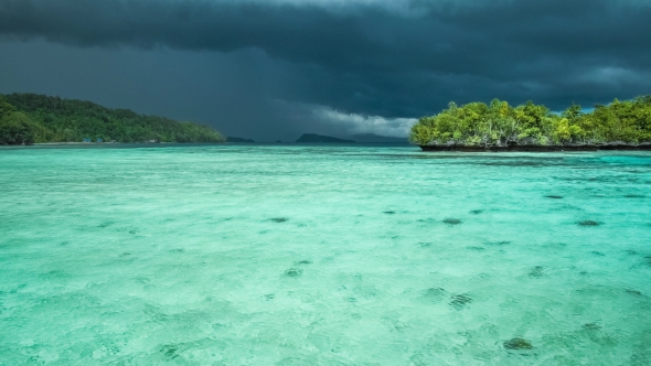 Beautiful Blue Lagoon with Pure Clear Water Shortly Before Thunderstorm Begining, Gam Island, West