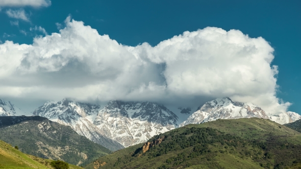  Intense Clouds Roiling and Flowing Over Peaks of the Mountain in Alaska