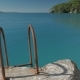 Bath Ladder with Rusted Handrails Leading Up From the Sea to Steep Pier - VideoHive Item for Sale